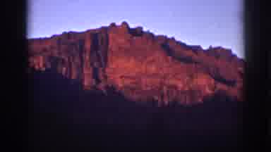 Lake Tahoe California (1939): View Of Red Sunset Against Mountain Rock On A Clear