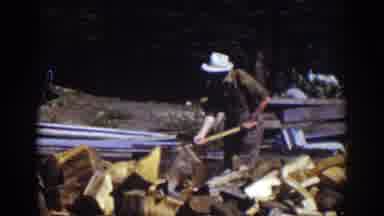 Lake Tahoe California (1939): Two Men Working Hard Chopping Wood Outdoors With