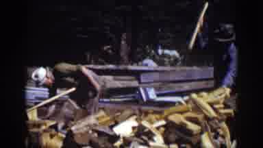 Lake Tahoe California (1939): A Old Man Cutting Wood In A Area Surrounded By A