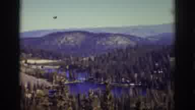 Lake Tahoe California (1939): View Of Green Trees Blue Lake And Mountain On A