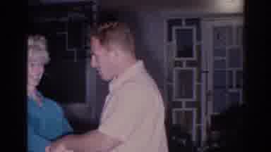 EL MONTE CALIFORNIA-1966: Playful Couple In Backyard Home Movie