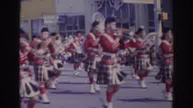 Norfolk Virginia (1966): Culturally Dressed Marching Band Performs In Streets
