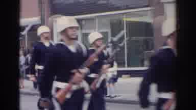 Norfolk Virginia (1966): A Group Of Military Men In Uniform March The Streets