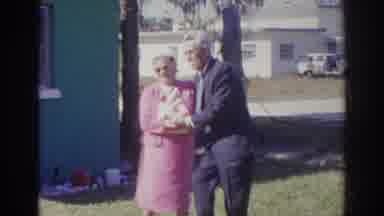 Norfolk Virginia (1966): Three Nicely Dressed People Outside Of A Green House Two
