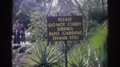Norfolk Virginia (1966): View Of Brown And Yellow Do Carry Drinks Into Garden Sign