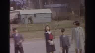 Norfolk Virginia (1966): Children Standing In The Street While Women Are watching