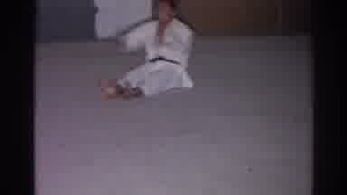 San Gabriel California (1966): A Martial Arts Fighter Is Doing Sit-Ups On A Mat