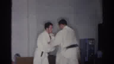 San Gabriel California (1966): Two Men Practicing Judo With One Man Grasping The