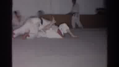 San Gabriel California (1966): Two People Wrestling In White Martial Arts Gis In A