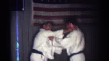 San Gabriel California (1966): Two Men Fighting With One Of Them Slamming The