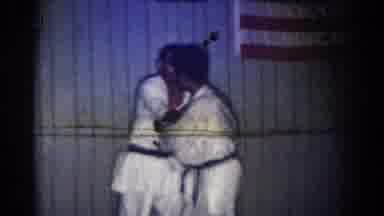 San Gabriel California (1966): Man Wearing White Karate Flips Second Man Wearing