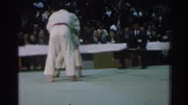 San Gabriel California (1966): Two Men Competing Karate In Front Of A Crowd