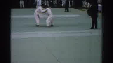 San Gabriel California (1966): Two People Dressed In White Compete In Indoor