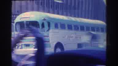 San Gabriel California (1966): Footage Of A Bus In Traffic A Park And A Crowd