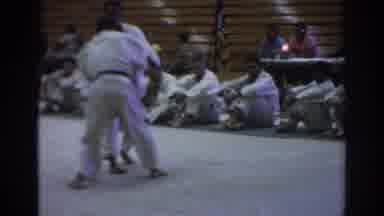Temple City California (1966): Two Martial Artists Fight In Front Of Other Seated