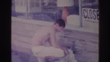 Temple City California (1966): Shirtless Guy Washing His Clothes In Front Of A