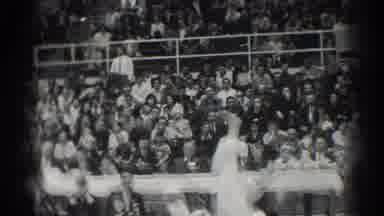 West Covina California (1966): Two People Wrestling Each Other In A Ring In Front