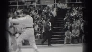 West Covina California (1966): Spectators Watching Two Male Fighters Spar At A