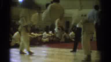 West Covina California (1966): Men In A Taekwondo Match In A Gymnasium