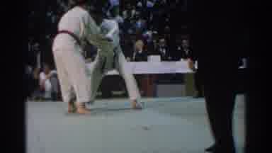 West Covina California (1966): Two Men Rolling In A Jiu Jitsu Match With A Large