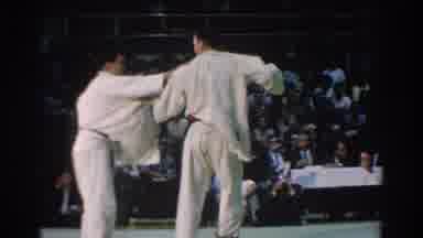 West Covina California (1966): Two Men Dueling In A Karate Match In Front Of An