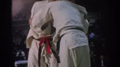West Covina California (1966): Two Athletic Men Fighting In A Karate Match