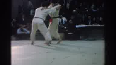 West Covina California (1966): Two Men Grappling In A Group Setting One Gets