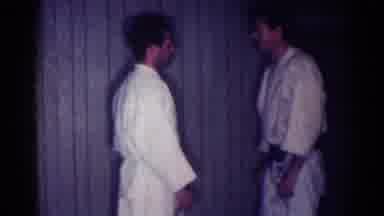 Los Angeles California (1967): Two White Men In White Clothing Practicing Martial