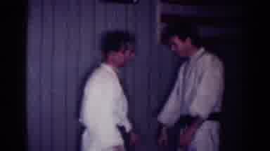 Los Angeles California (1967): Two Men Showing Karate Judo Hand Grab Move