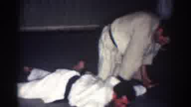 Los Angeles California (1967): Man Wearing White Karate Puts Second Man Wearing