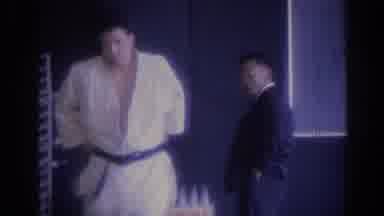 Los Angeles California (1967): Man In Martial Arts Outfit With White Belt Followed