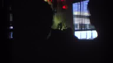 Los Angeles California (1967): People Inside A Dark Room With Windows That Have