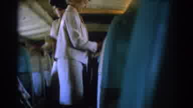 Los Angeles California (1967): Two Female Flight Attendants Working In Plane