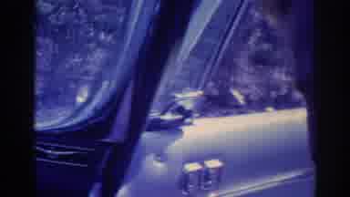Los Angeles California (1967): Images Of A Person Inside A Stationary Car