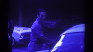 Los Angeles California (1967): Man Reaching Into A Car Through The Window Then