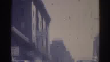 Los Angeles California (1967): View From Moving Car Of Buildings Along Street With