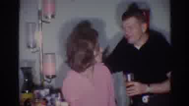 Los Angeles California (1967): Woman Pulls Man's Nose Hair While They Hold