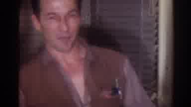 Los Angeles California (1967): Smiling Man Talking In Home With Another Man And