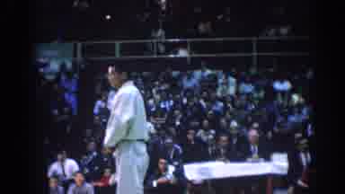 Los Angeles California (1967): People Watch The Karate Tournament As The Man