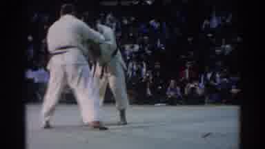 Los Angeles California (1967): Two Men Wearing Judo Grapple During A Martial Arts