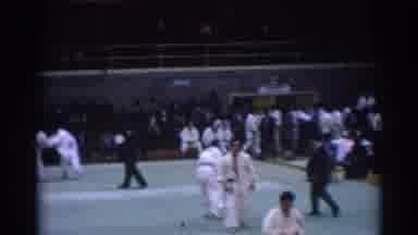 Los Angeles California (1967): Crowds Gather In Gymnasium As Karate Fighters Warm