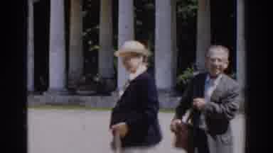 Moscow Russia (1968): Woman Wearing Red Heels Walks Toward Bench On Windy Day