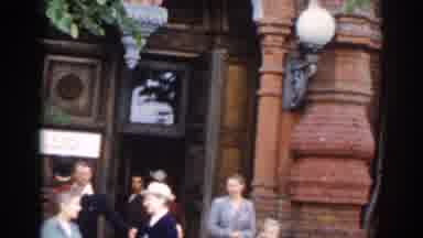 MOSCOW RUSSIA-1968: A Young Woman In A Hat At A Church Entrance