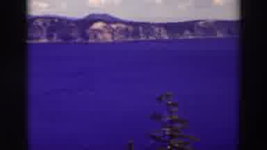 Crater Lake Oregon-1937: Panoramic View Of Lake And Mountain On A Spring Day