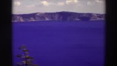 Crater Lake Oregon (1937): Large Body Of Water And Cliffs