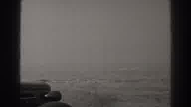 Long Beach California (1937): Black And White Shot Of An Old Car Parked At A Beach