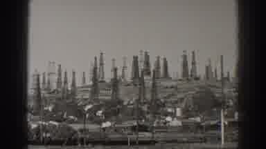 Long Beach California (1937): Crowded Towers Along A Hillside Behind A Small