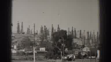 Long Beach California (1937): View Of Grey Tower Structures And Paved Road On A