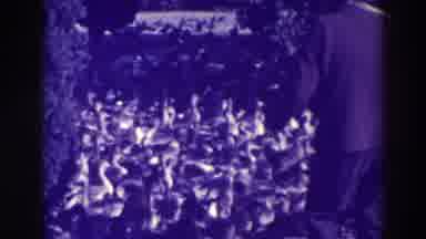 Oakland California (1937): A Man With A Briefcase And Hat Confronting Hundreds Of