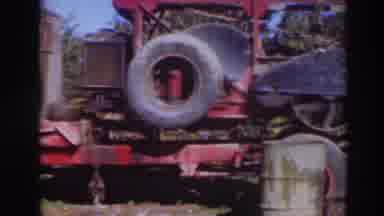 Sacramento California (1937): Two People Working On Constructing A Red Object